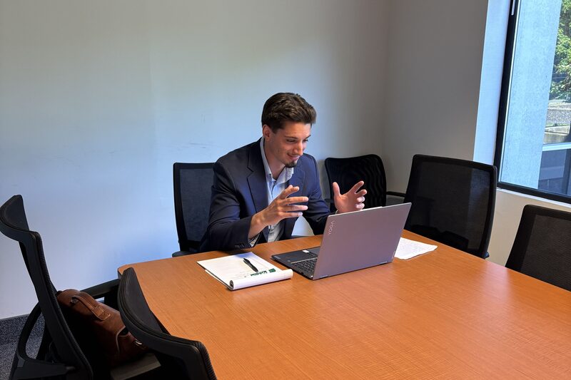 Helios Acquisitions team member working in the office