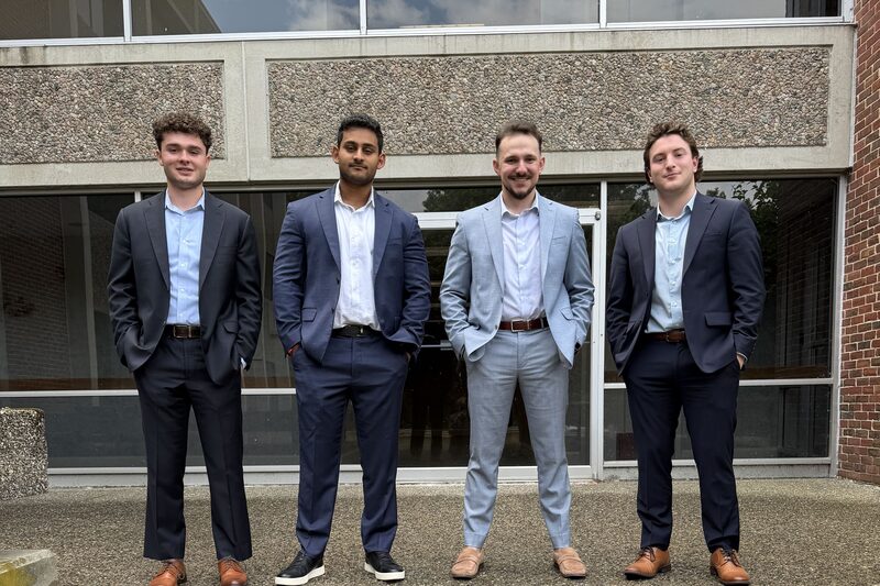 Helios Acquisitions team members outside the office